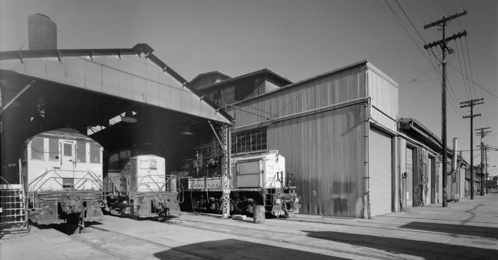 Southern Pacific Sacramento Shops Firing line shed and north end of boiler shop, looking southeast. Jet Lowe, photographer
